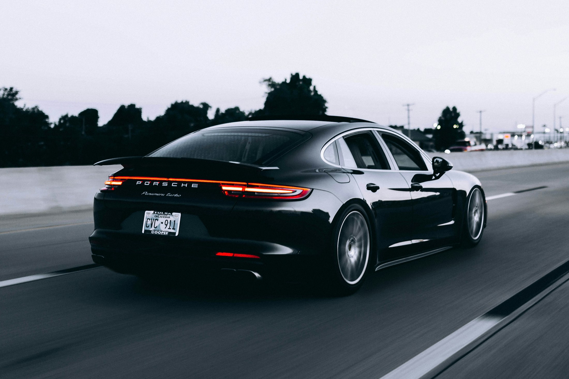 Sports car driving on a mountain road